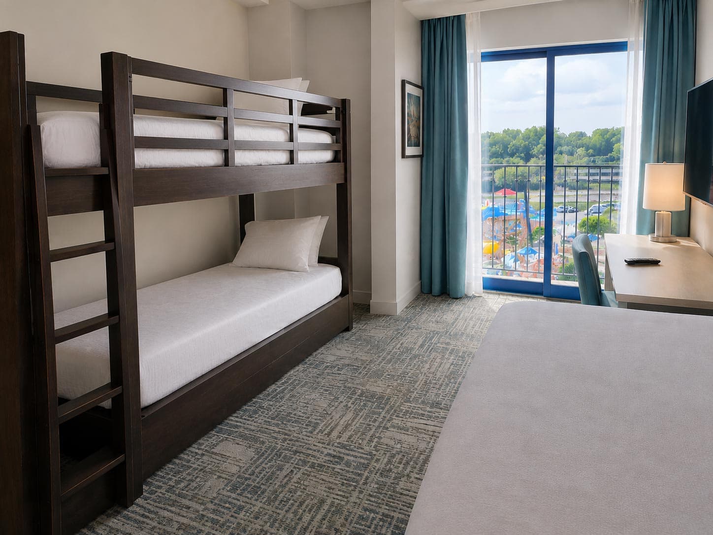 Platform-style bunk bed in a hospitality guest room secured with Bed Tape